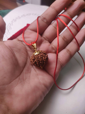 gold pendant with rudraksha beads