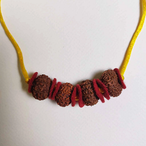 Rudraksha necklace with a yellow string and red beads