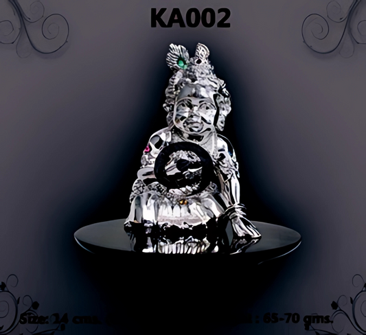 silver idol of Lord Krishna