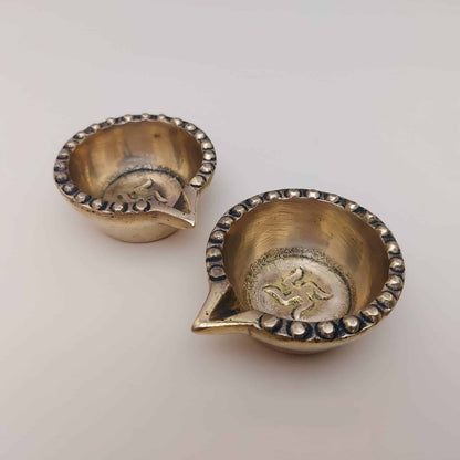 Brass Swastik Diya Pair