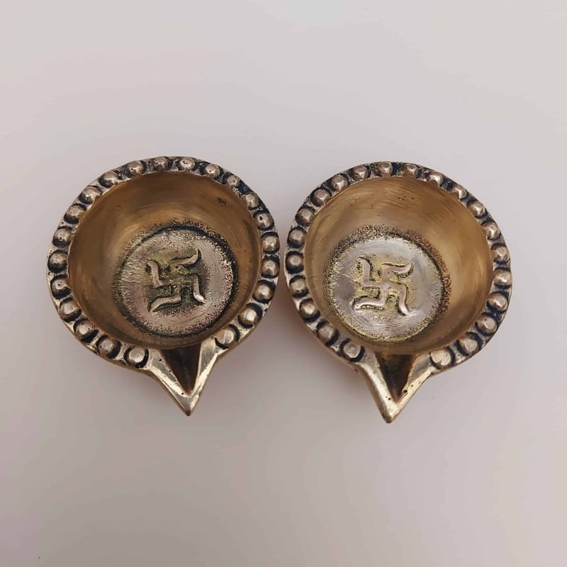 Brass Swastik Diya Pair