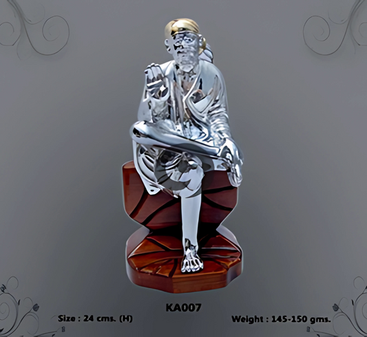 silver sculpture of Sai Baba